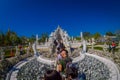 CHIANG RAI, THAILAND - FEBRUARY 01, 2018: Outdoor view of unidentified people walking to visit the beautiful ornate