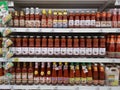 CHIANG RAI, THAILAND - FEBRUARY 15 : various brands of red hot chilli sauce sold in supermarket on February 15, 2019 in Chiang