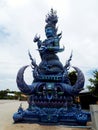 Blue sculpture at the entrance of the Blue Temple in Chiang Rai, Thailand