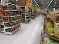 CHIANG RAI, THAILAND - MARCH 7, 2019 : Perspective view of aisle in supermarket with products on shelf on March 7, 2019 in Chiang