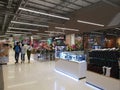 CHIANG RAI, THAILAND - MARCH 7, 2019 : three unidentified people walking in Big C super center on March 7, 2019 in Chiang rai,