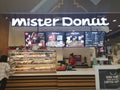 CHIANG RAI, THAILAND - MARCH 7, 2019 : unidentified female worker preparing food in Mister Donut cafe in department store on March