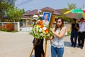 CHIANG RAI, THAILAND - MARCH 2 : Unidentified women holding the photo of dead