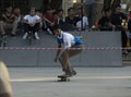 Extreme sports activity outdoor. Young skater boy rides on a skateboard