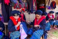 Unidentified female Mien hilltribe embroider pattern colored thread at Doi Mae Salong