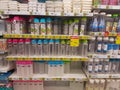 CHIANG RAI, THAILAND - SEPTEMBER 3 : Variety types of disposable styrofoam dinnerwares and bottles on supermarket shelf on Royalty Free Stock Photo