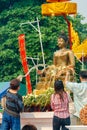 CHIANGMAI, THAILAND - APRIL 13: People pouring water to Buddha Phra Singh at Phra Singh temple in Songkran festival on April 13