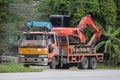 Private Kubota backhoe on truck.