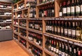 CHIANGMAI,THAILAND - January 3,2024 -Variety of Imported Wine,Local Wine,Sparkling wines bottles on wooden shelves at Supermarket