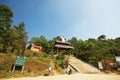 Concrete stair to Entrance wooden arch Thai-lanna style into Doi Pha Tang is beautiful Mountain in Thailand