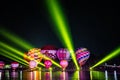 CHIANGRAI, THAILAND - February 15, 2019: Vivid hot air ballons with the light show in the dark night sky at Singha Park Chiang