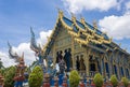 Blue Yellow Thai Church and Serpent or Naga in Wat Rong Sues Ten Temple