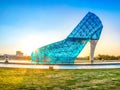 A giant blue glass wedding church shaped like a high-heeled shoe in Taiwan Chiayi, aerial view. Time-lapse photography.