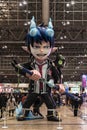 Huge inflatable structure of Blue Exorcist character floating at Jump Festa.