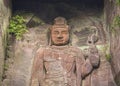 Close-up on the Hyaku-shaku kannon buddha carved in Mount Nokogiri stone quarry.