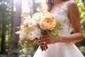 a chic bouquet in the hands of a bride in a white dress. Luxury wedding bouquet.