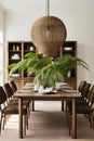 A chic dining room with a collection of hanging ferns.