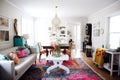 chic and eclectic home with mismatched furniture, vintage decor, and bright pops of color