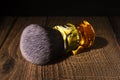 Chic shaving brush for classic shaving on a rustic wooden background