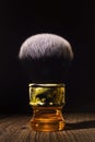 Posh shaving brush for classic shaving on a rustic background