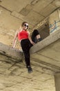 chic woman posing at abandoned construction site Royalty Free Stock Photo