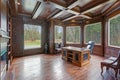 Chic Wood Paneled Home office features coffered ceiling Royalty Free Stock Photo