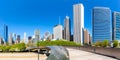 Chicago city downtown skyline skyscraper and BP Pedestrian Bridge panorama in the United States