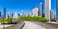 Chicago city downtown skyline skyscraper and BP Pedestrian Bridge panorama in the United States