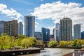 Chicago city skyscrapers on the river canal, blue sky background Royalty Free Stock Photo