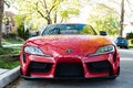 Chicago City, USA - April 26, 2023: 2022 Toyota Supra 2.0 red sport car front details parked