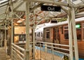 Chicago's green line elevated el train entering Adams/Wabash station, as seen from platform Royalty Free Stock Photo