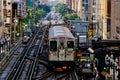 Chicago elevated `el` train on tracks above the city, transporting commuters. Royalty Free Stock Photo