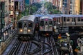Chicago elevated `el` train on tracks above the city, transporting commuters. Royalty Free Stock Photo