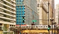 Chicago elevated 'el' train at rush hour on Wacker & LaSalle street corner in downtown Loop. Royalty Free Stock Photo