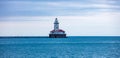 Chicago harbor light in the afternoon, blue lake water and sky background Royalty Free Stock Photo