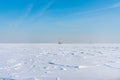 Lake Michigan in Chicago Frozen Over with Snow after a Polar Vortex with a Lighthouse in the distance Royalty Free Stock Photo