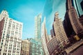 CHICAGO, IL - APRIL 2: Cloud Gate and Chicago skyline on April 2, 2014 in Chicago, Illinois. Cloud Gate is the artwork of Anish Royalty Free Stock Photo