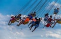 CHICAGO, IL, July 02, 2017: Children ride the wave swinger, at