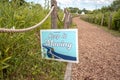 Chicago, IL - June 23rd, 2020: The Chicago Park District posted signs along the re-opened lakefront trails with a Keep it Moving Royalty Free Stock Photo