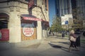 Customer exit Trader Joe`s discount retailer in downtown Chicago