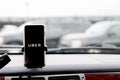 Chicago,IL,USA,Feb-21,2017,Smartphone attached to a car mount in car with Uber logo for editorial use only Royalty Free Stock Photo