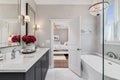 A beautiful master bathroom looking towards a bedroom. Royalty Free Stock Photo