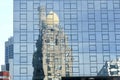 The top of The Chicago Intercontinental Hotel reflected in The Aston Apartment Block Building. Royalty Free Stock Photo