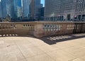 Shadows of designs on the barrier between upper Wacker Dr and the Chicago River