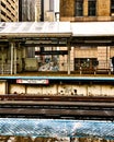 Sign that says `Danger - Keep Off Tracks - High Voltage` on Chicago elevated train track in the Loop. Royalty Free Stock Photo