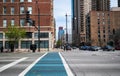 CHICAGO, ILLINOIS - APRIL 18, 2021: Downtown Chicago city street view background showing a blue cross walk near the South Loop Royalty Free Stock Photo
