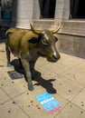 Bronze cast cow commemorating Chicago`s 1999 exhibition in front of the Chicago Cultural Center