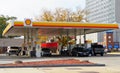 Chicago, Illinois, U.S - October 14, 2018 - Drivers putting gas in their car at Shell gas station