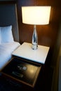 CHICAGO, ILLINOIS, UNITED STATES - May 12, 2018: Luxury hotel room with safe in nightstand drawer