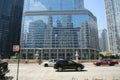 Traffic on Wacker Drive with mirrored buildings in the background